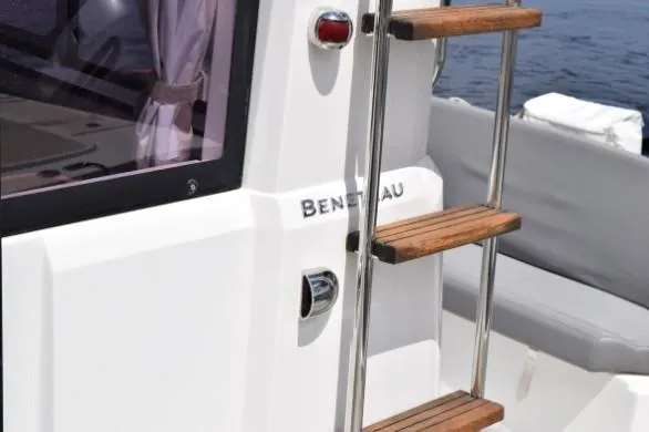 Slide: The Image of 2013 Beneteau Barracuda 9 boat with wooden ladder and sleek design. - 22