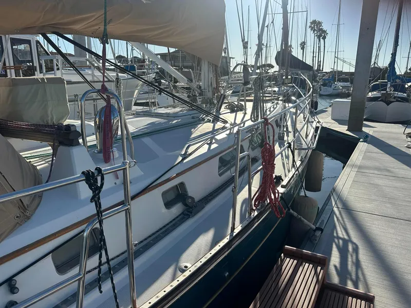 Slide: The Image of Sailboat docked at marina, Passport Royal 43, 1999 model, sunny day. - 7