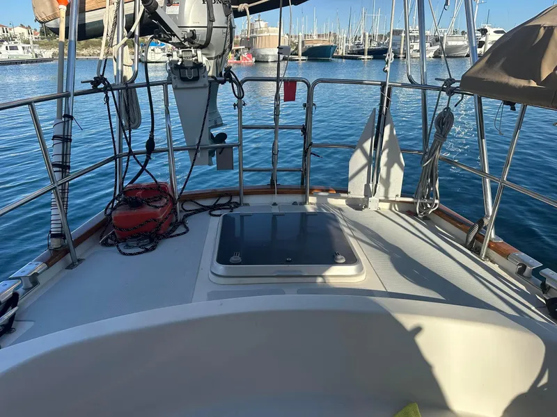 Slide: The Image of Sailboat deck view with marina background, Passport Royal 43, 1999 model. - 8