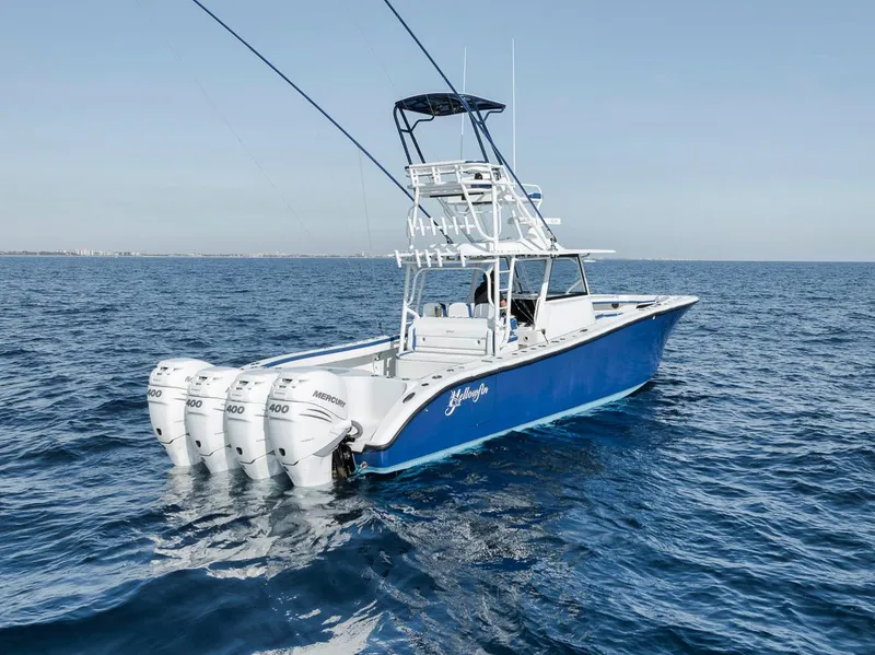 Slide: The Image of 2020 Yellowfin 42 Offshore boat with quad outboard engines on open sea. - 10