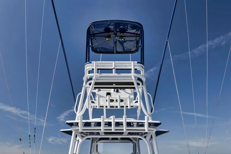 Slide: The Image of Yellowfin 42 Offshore 2020 boat tower against clear blue sky. - 27