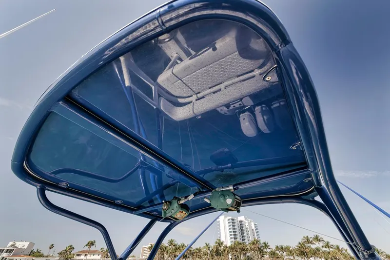 Slide: The Image of 2020 Yellowfin 42 Offshore boat canopy with clear blue sky background. - 36