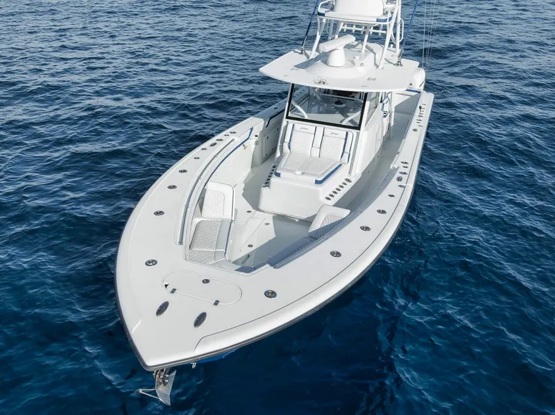 Slide: The Image of 2020 Yellowfin 42 Offshore boat on open water, aerial view. - 7