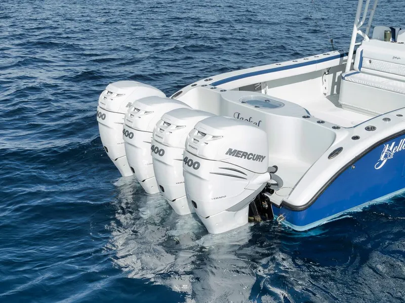 Slide: The Image of 2020 Yellowfin 42 Offshore boat with four Mercury 400 outboard engines on blue ocean water. - 9