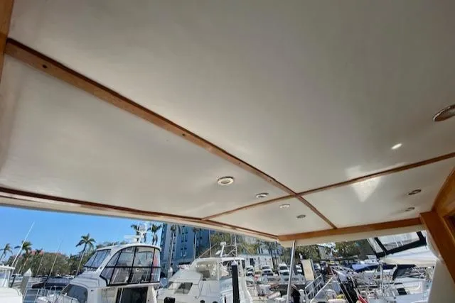 Slide: The Image of 1971 Matthews Motor Yacht interior ceiling with marina view. - 27