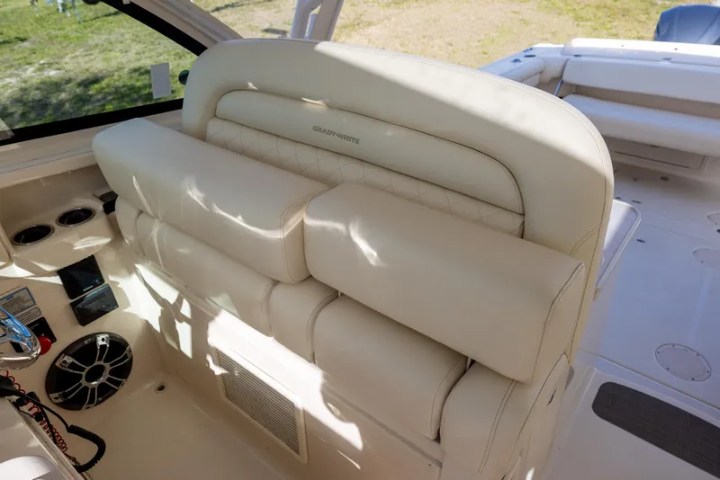 Slide: The Image of 2019 Grady-White Freedom 375 boat interior with plush seating and cup holders. - 12
