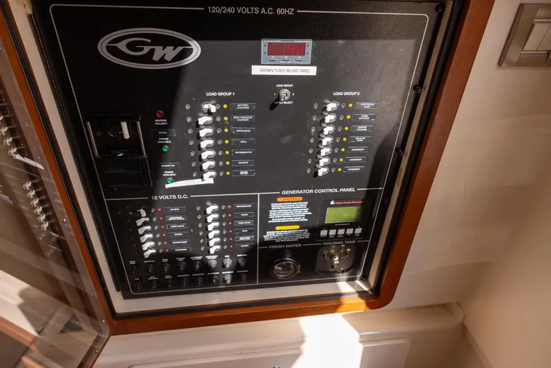 Slide: The Image of Electrical control panel on a 2019 Grady-White Freedom 375 boat. - 18