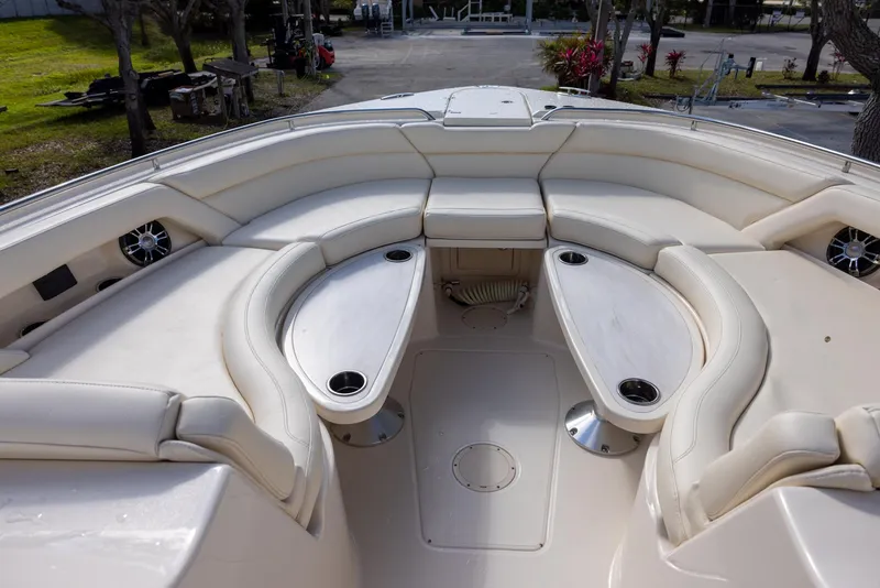Slide: The Image of 2019 Grady-White Freedom 375 boat interior with spacious seating and cup holders. - 19