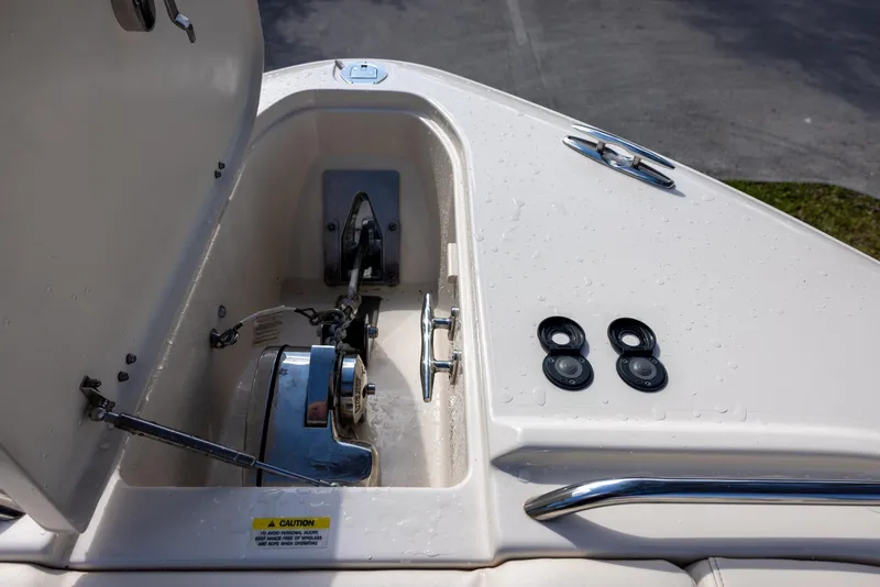 Slide: The Image of 2019 Grady-White Freedom 375 boat anchor compartment with winch and cleats. - 20