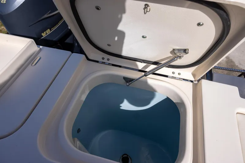 Slide: The Image of Open storage compartment on 2019 Grady-White Freedom 375 boat. - 25