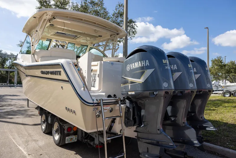 Slide: The Image of 2019 Grady-White Freedom 375 boat with Yamaha engines on a trailer. - 4