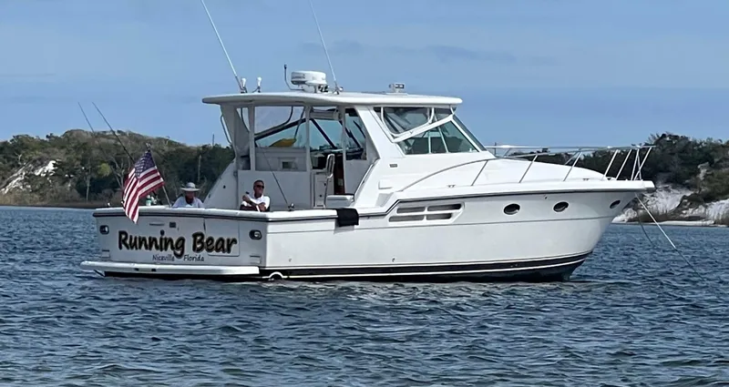The Image of 2001 Tiara Yachts 4100 Open boat named "Running Bear" on the water. - 0
