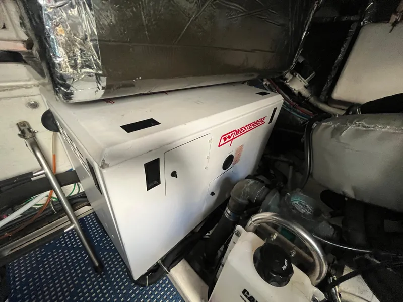Slide: The Image of Engine room of 2001 Tiara Yachts 4100 Open with Westerbeke generator. - 12