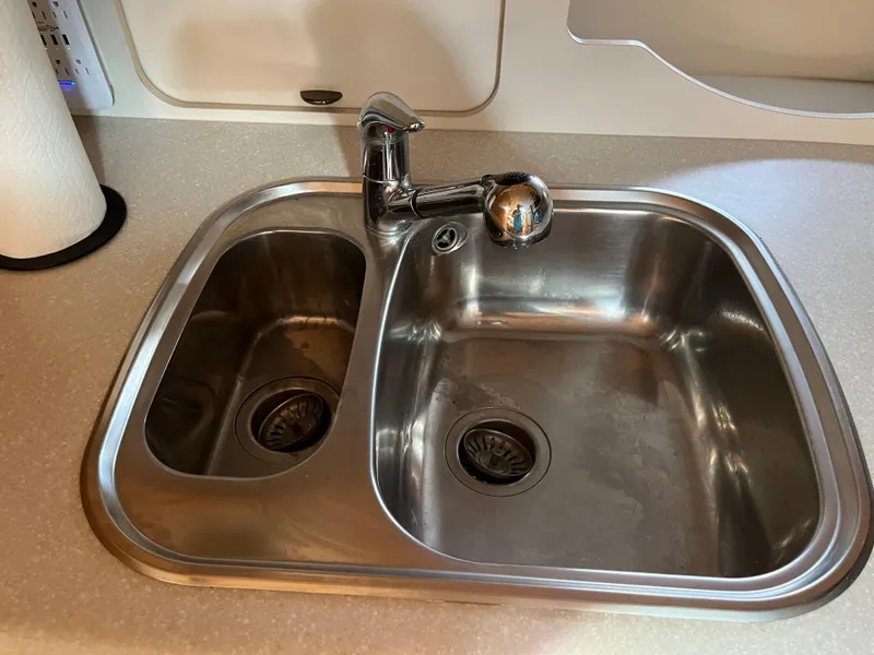 Slide: The Image of Stainless steel sink in 2001 Tiara Yachts 4100 Open kitchen area. - 30