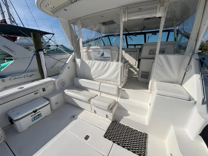 Slide: The Image of 2001 Tiara Yachts 4100 Open interior with seating and helm area. - 47