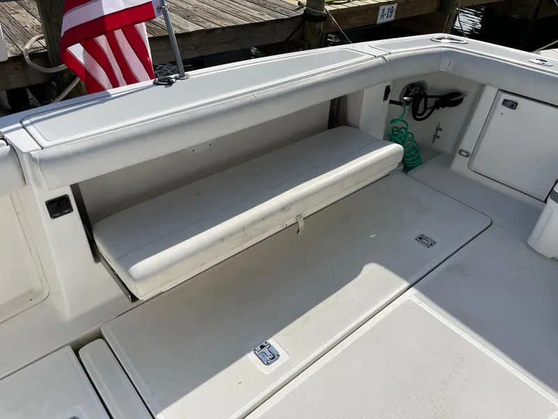 Slide: The Image of 2001 Tiara Yachts 4100 Open boat deck with seating and storage. - 49