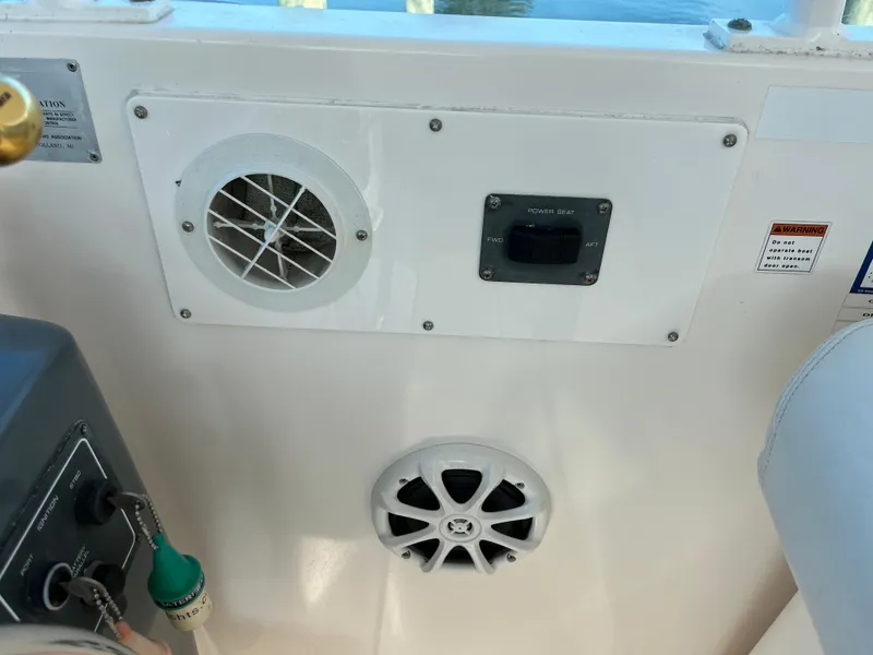 Slide: The Image of Control panel and speaker on a 2001 Tiara Yachts 4100 Open boat. - 6