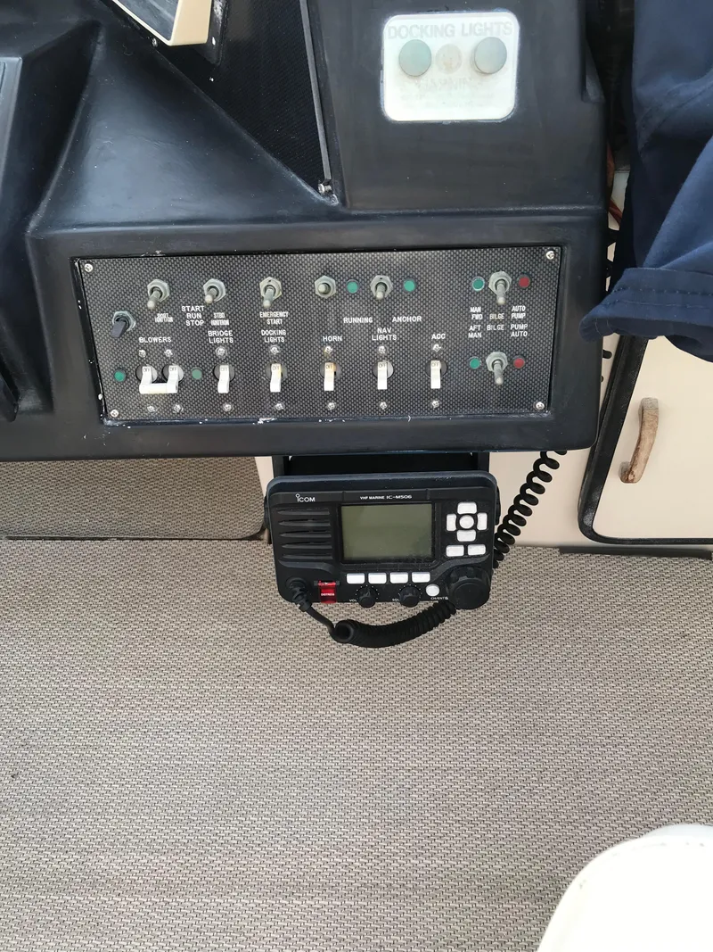 Slide: The Image of Control panel of 1987 Sea Ray 410 Aft Cabin boat with radio equipment. - 45
