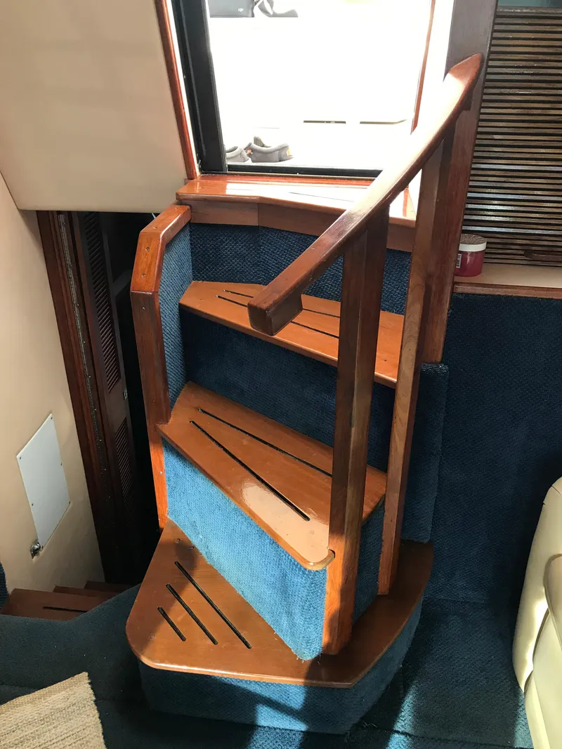 Slide: The Image of Wooden staircase in 1987 Sea Ray 410 Aft Cabin yacht interior. - 51