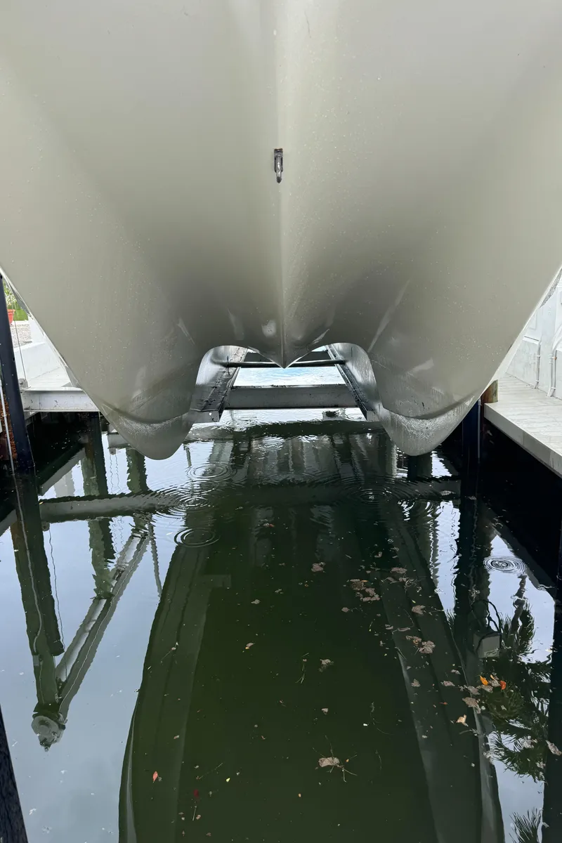 Slide: The Image of Underwater view of a 2009 Mamba 350 boat hull in a dock. - 15