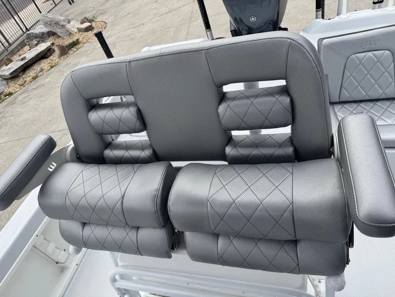 Slide: The Image of 2024 Blue Wave 2400 PureBay boat seat with gray diamond-stitched upholstery. - 10