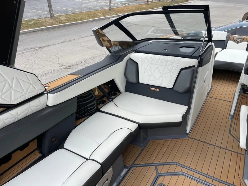 Slide: The Image of 2023 Nautique Super Air Nautique G25 Paragon interior with luxurious seating and modern design. - 10
