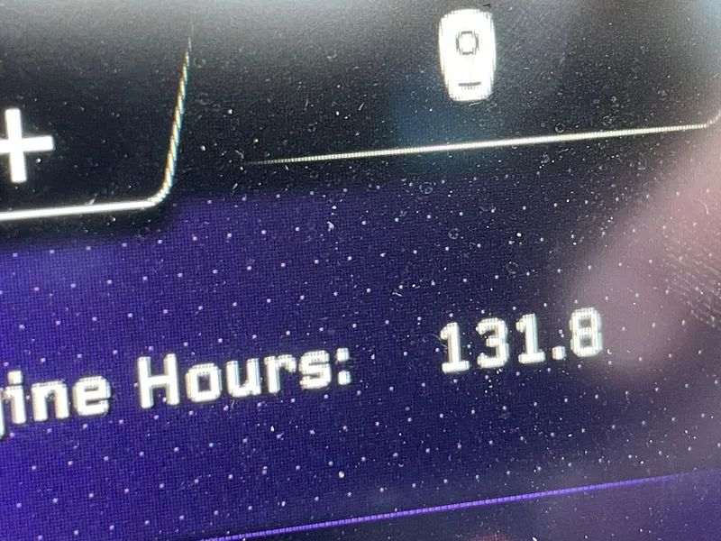 Slide: The Image of 2023 Nautique Super Air Nautique G25 Paragon display showing 131.8 engine hours. - 12