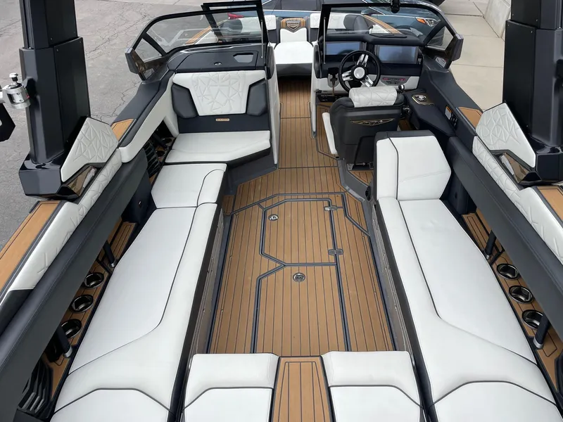 Slide: The Image of 2023 Nautique Super Air Nautique G25 Paragon interior with luxurious seating and sleek design. - 5