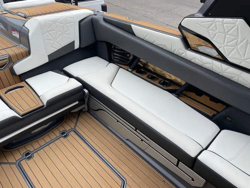 Slide: The Image of 2023 Nautique Super Air Nautique G25 Paragon interior with luxurious seating and modern design. - 9