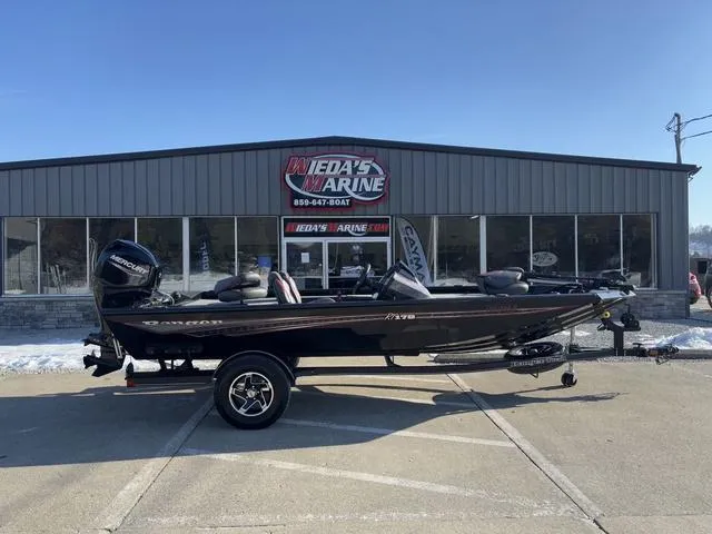 Slide: The Image of 2021 Ranger RT178 boat displayed outside Wieda's Marine dealership. - 1
