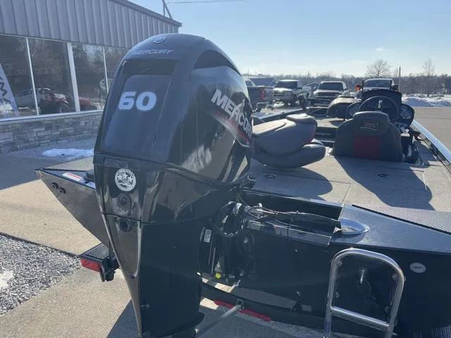 Slide: The Image of 2021 Ranger RT178 boat with Mercury 60 outboard motor in a sunny outdoor setting. - 2