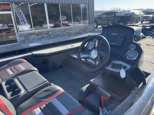 Slide: The Image of 2021 Ranger RT178 boat interior with steering wheel and dashboard controls. - 4