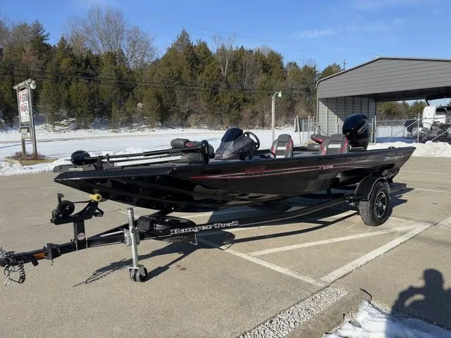 Slide: The Image of 2021 Ranger RT178 boat on trailer in snowy parking lot. - 9