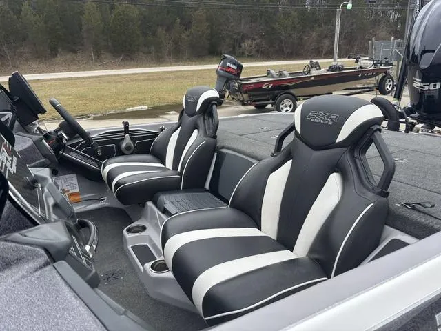Slide: The Image of 2020 Skeeter FXR20 Limited boat interior with black and white seats. - 13