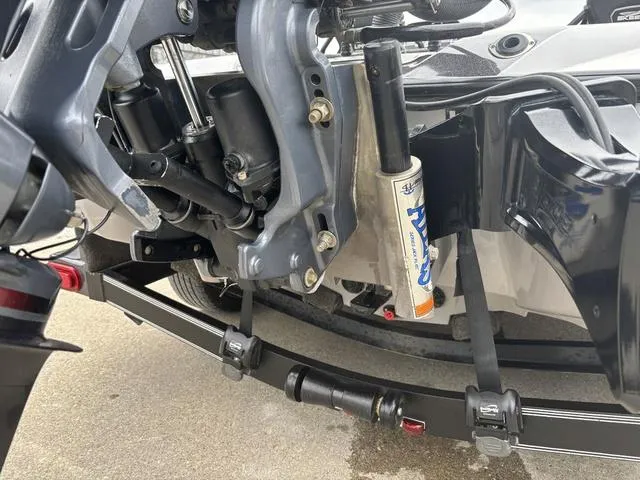 Slide: The Image of 2020 Skeeter FXR20 Limited boat trailer suspension and shock absorber detail. - 3