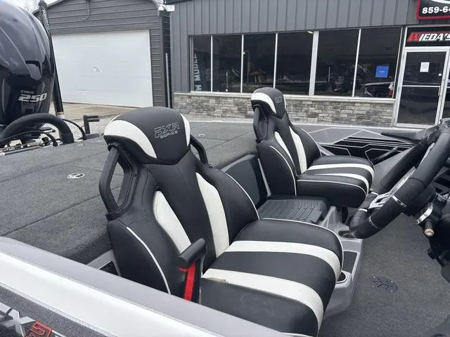 Slide: The Image of 2020 Skeeter FXR20 Limited boat interior with black and white seats. - 7