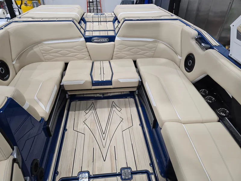 Slide: The Image of Luxurious interior of 2025 Supra SV boat with beige seating and stylish flooring. - 20