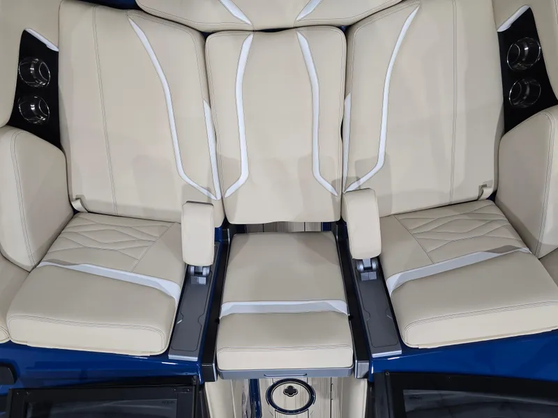 Slide: The Image of 2025 Supra SV interior with beige leather seats and modern design. - 33