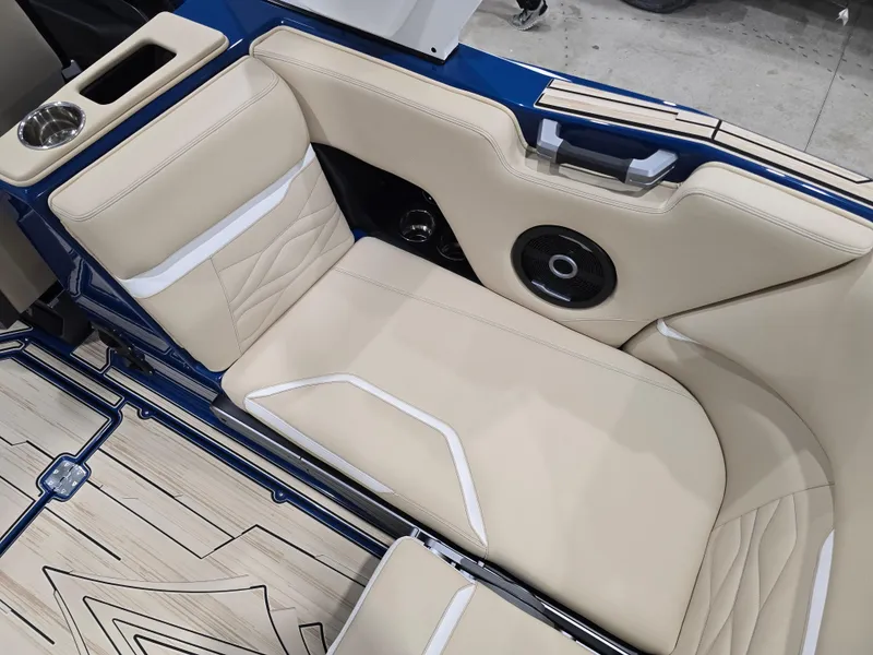 Slide: The Image of 2025 Supra SV interior with beige leather seats and integrated speaker system. - 39