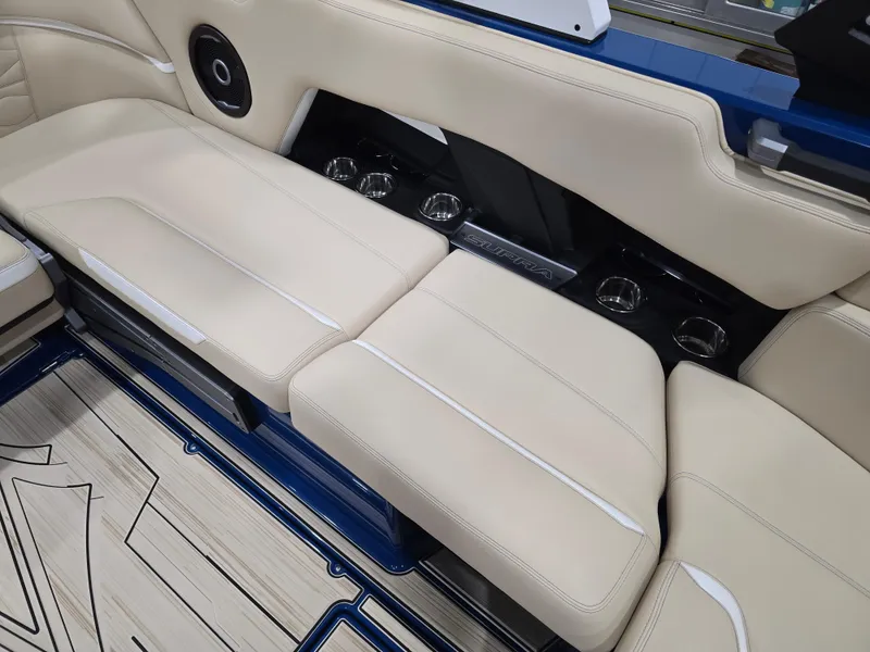 Slide: The Image of 2025 Supra SV boat interior with beige seating and integrated speakers. - 42