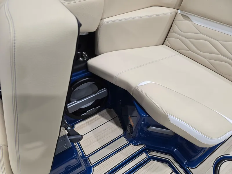 Slide: The Image of 2025 Supra SV interior with beige leather seats and blue accents. - 45