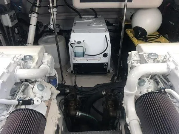 Slide: The Image of Engine room of 2010 Sea Ray 610 Sundancer with visible machinery and components. - 30