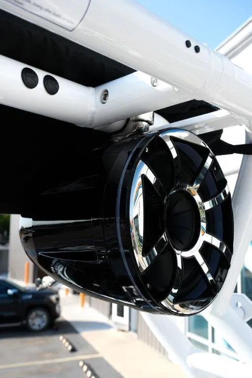 Slide: The Image of 2025 Moomba Max boat speaker with sleek black and chrome design. - 10