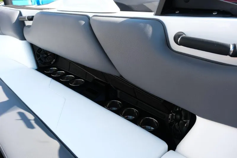 Slide: The Image of 2025 Moomba Max interior with cup holders and sleek seating design. - 20