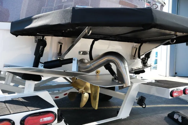 Slide: The Image of 2025 Moomba Max boat stern with propeller and exhaust system. - 6