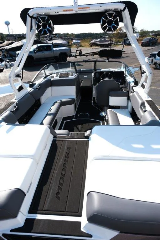 Slide: The Image of 2025 Moomba Max boat interior with sleek seating and advanced audio system. - 7