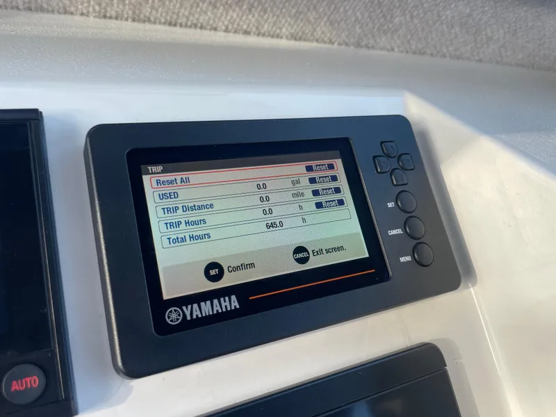 Slide: The Image of Yamaha display on 2020 Parker 2320 Sport Cabin showing trip and total hours. - 25