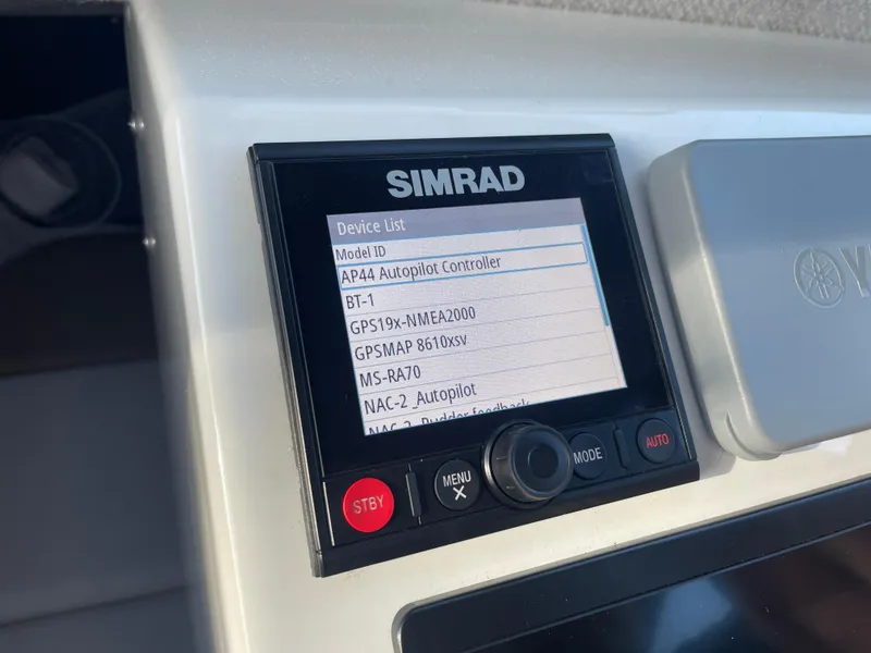 Slide: The Image of Simrad device display on 2020 Parker 2320 Sport Cabin boat dashboard. - 27