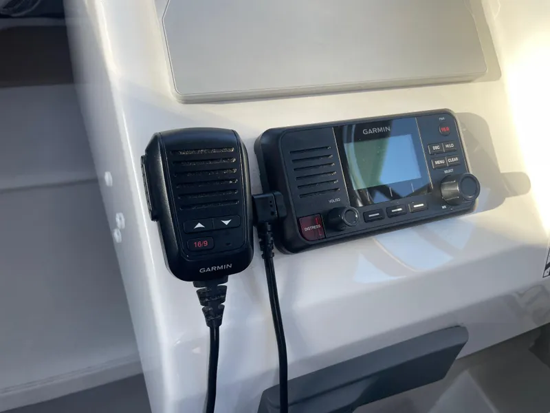 Slide: The Image of Garmin marine radio and microphone on Parker 2320 Sport Cabin, 2020 model. - 28