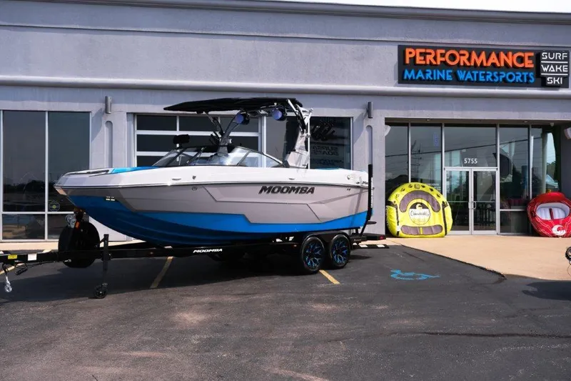 The Image of 2025 Moomba Max boat displayed at Performance Marine Watersports dealership. - 1